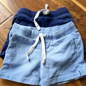 Set of 2 Primary track shorts in vintage blue and navy size 4-5